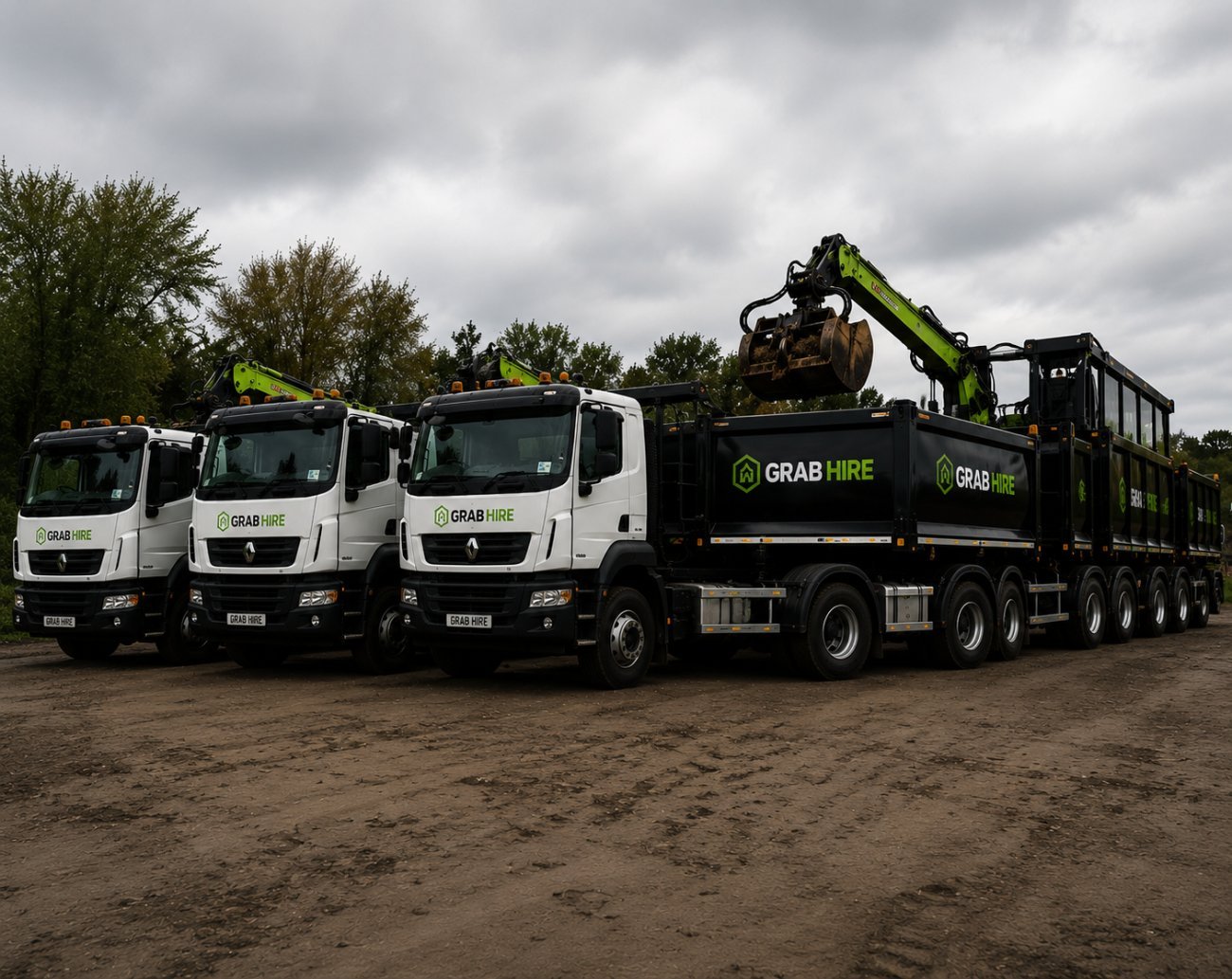 Green grab lorry loading construction waste in Warrington